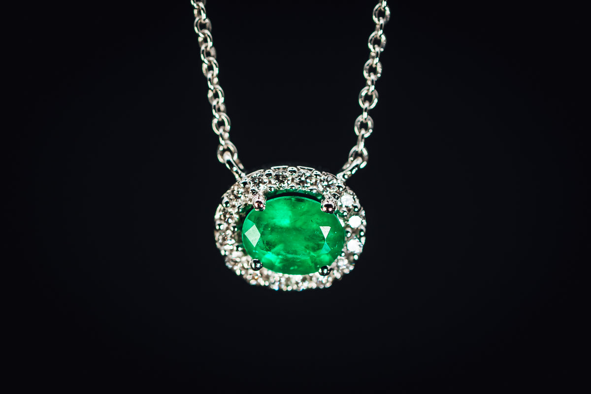 14k White Gold Emerald and Diamond Halo Pendant