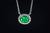 14k White Gold Emerald and Diamond Halo Pendant