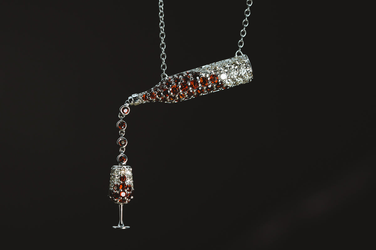 14k White Gold Mozambique Garnet and Diamond Wine Bottle and Glass Pendant