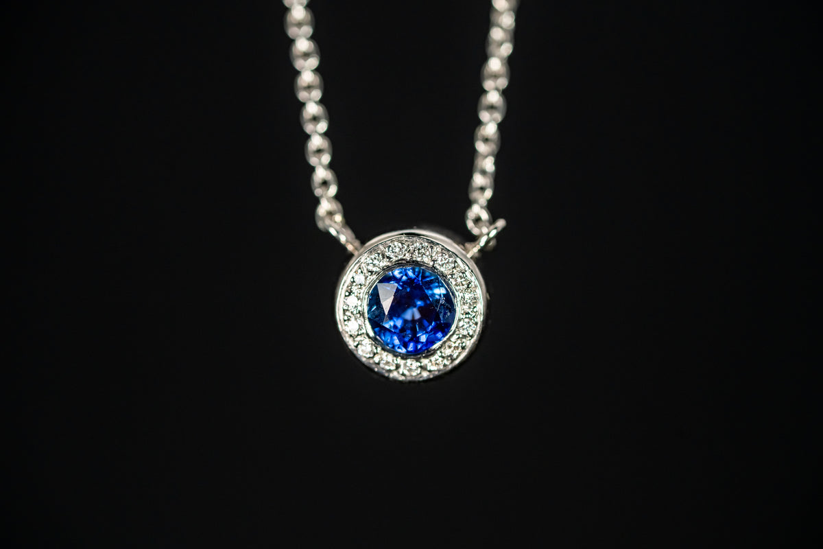 Platinum Blue Sapphire and Diamond Halo Necklace