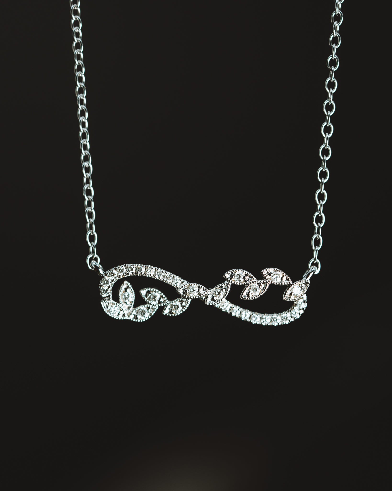 14k White Gold Diamond Infinity Style Necklace