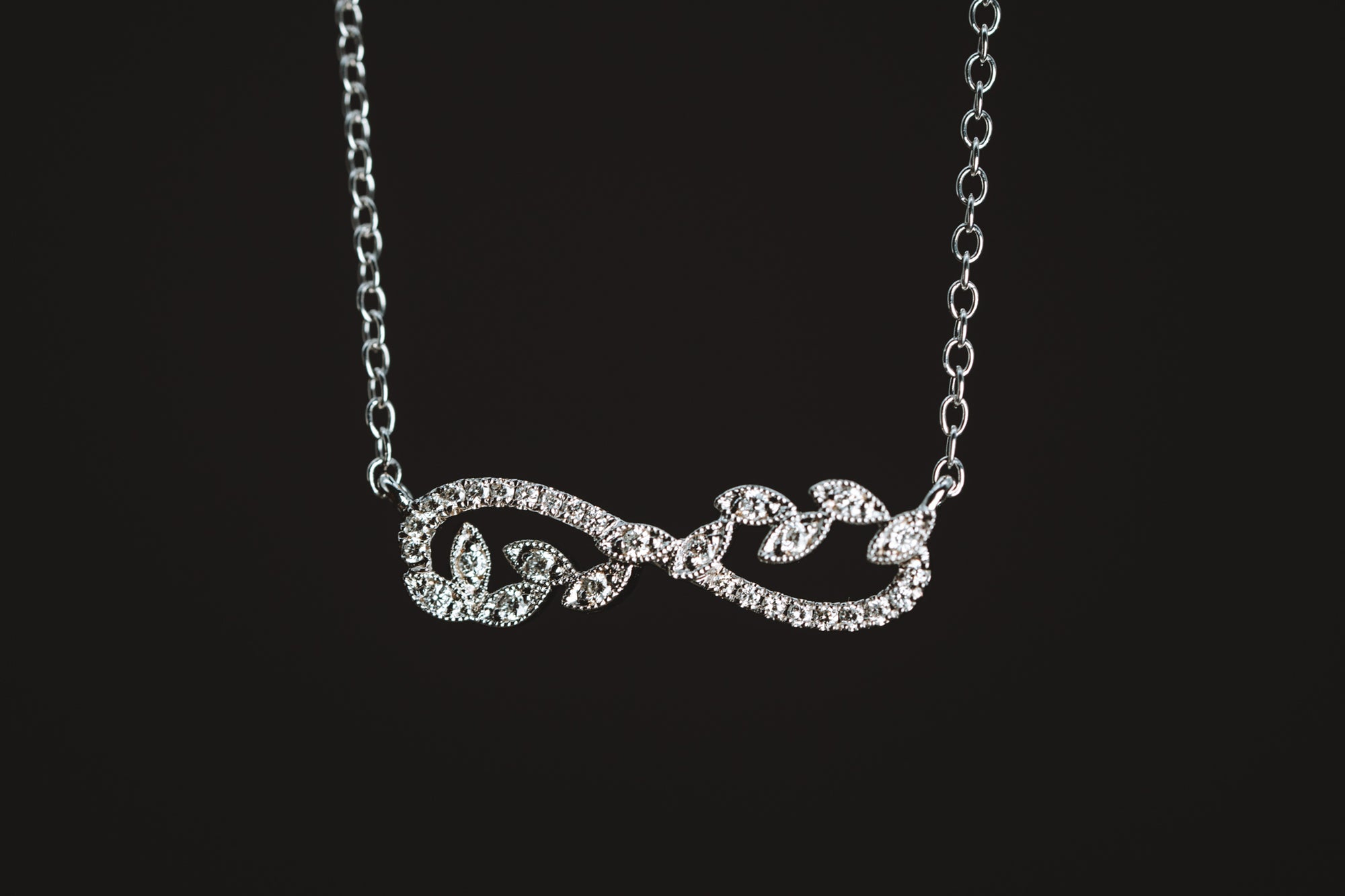 14k White Gold Diamond Infinity Style Necklace