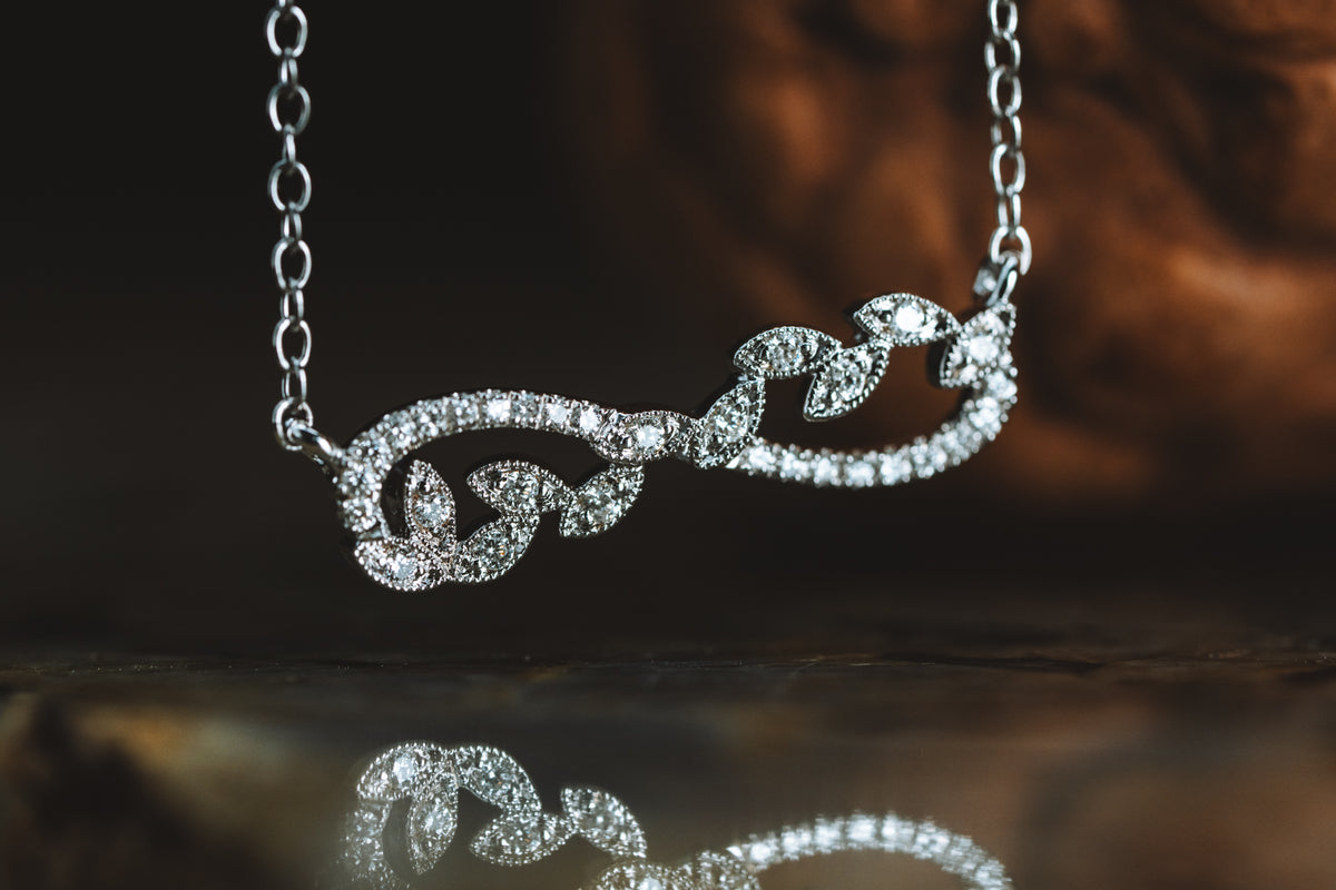 14k White Gold Diamond Infinity Style Necklace