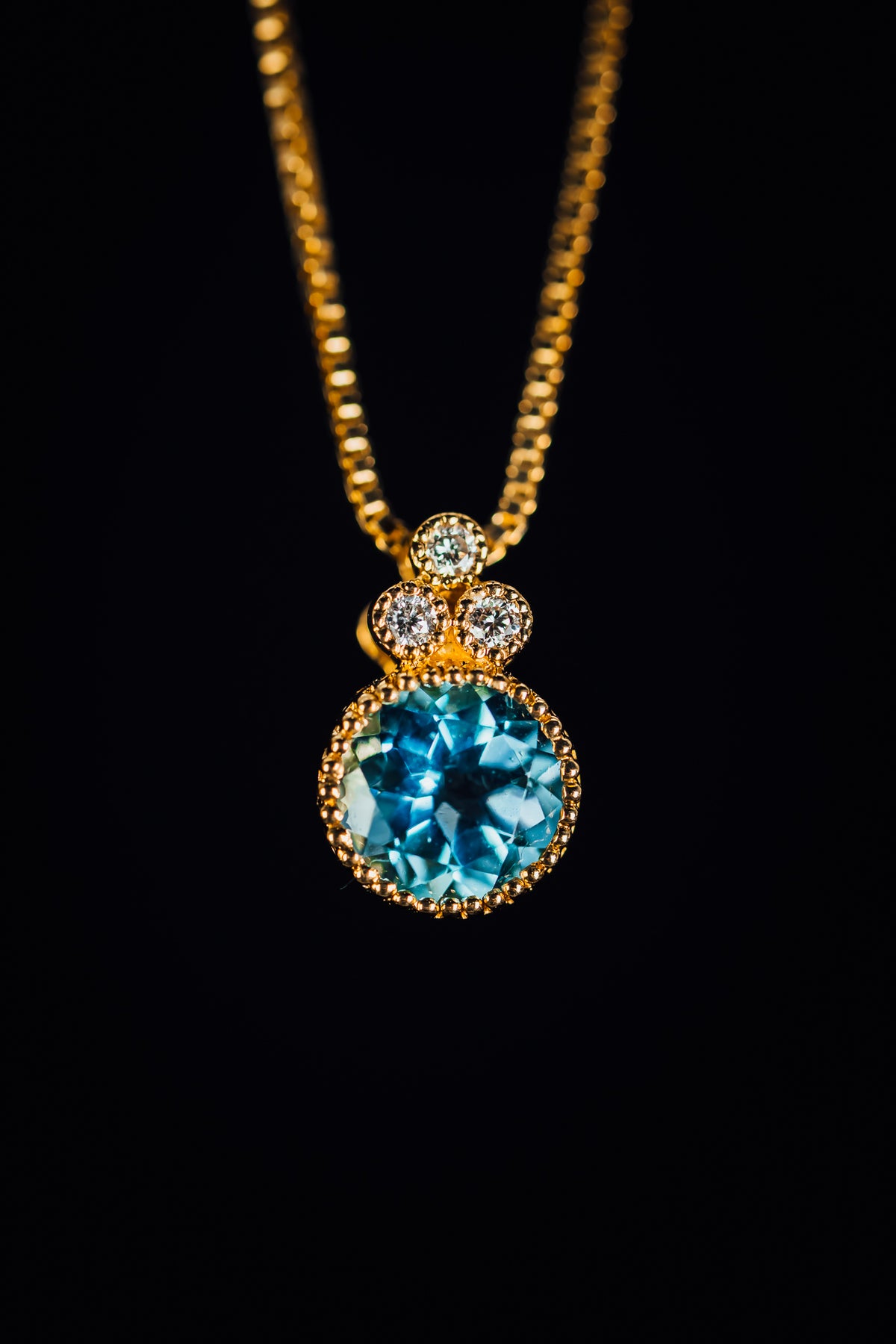 14k Yellow Gold Blue Topaz and Diamond Pendant