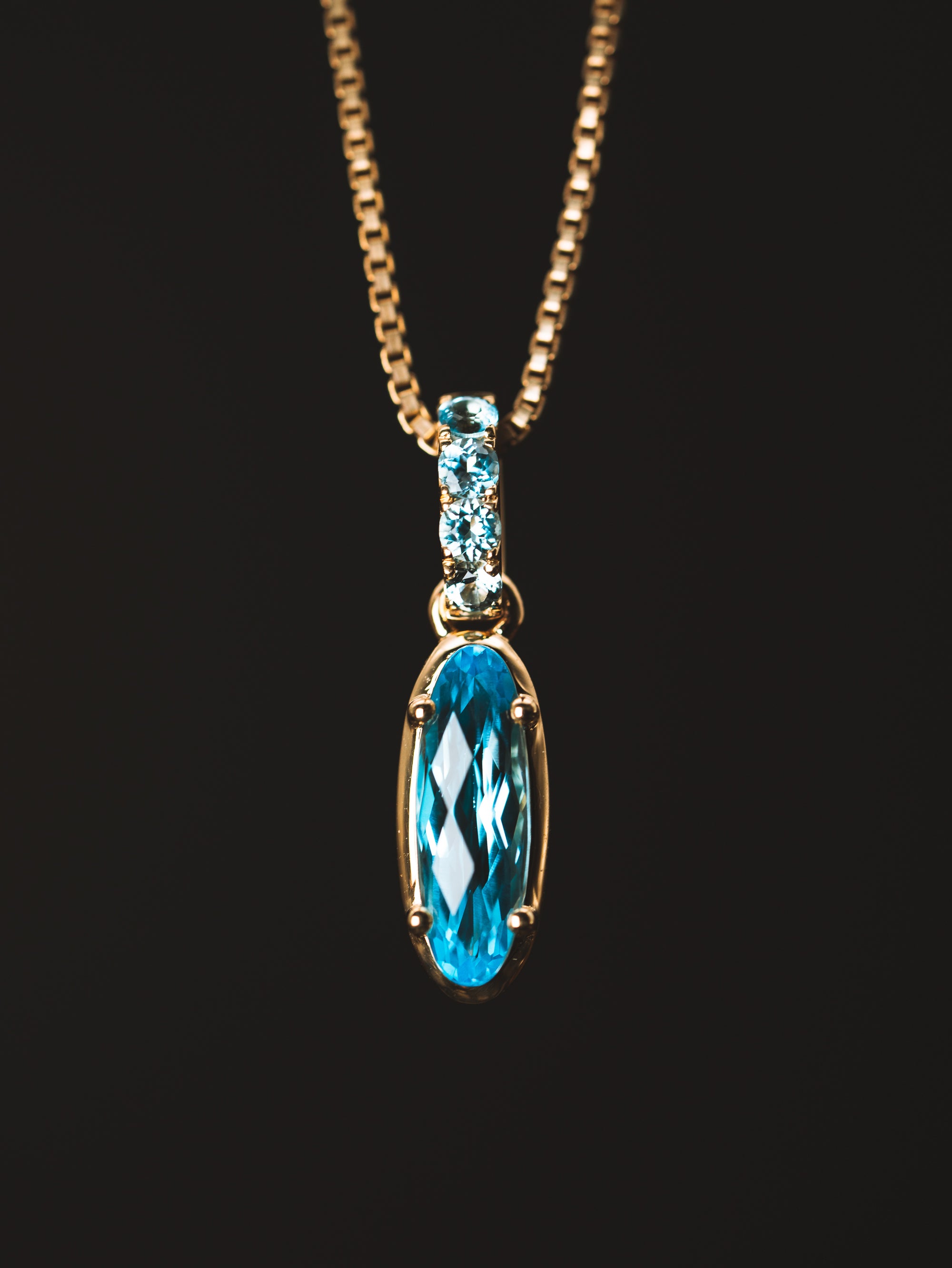 14k Yellow Gold Blue Topaz Pendant