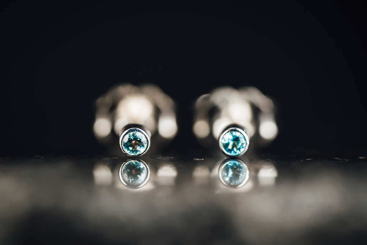 14k White Gold Blue Topaz Tiny Stud Earrings