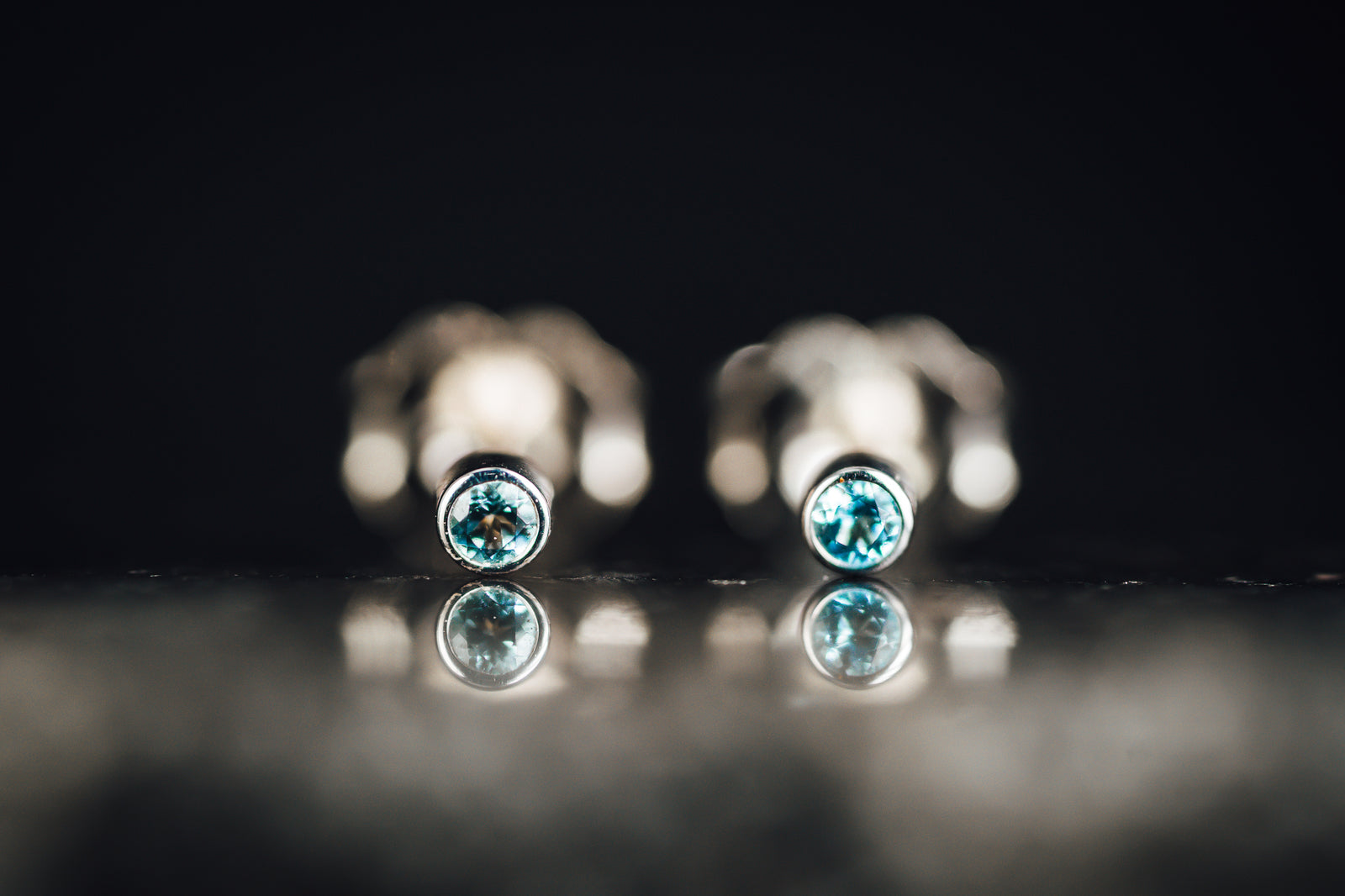 14k White Gold Blue Topaz Tiny Stud Earrings