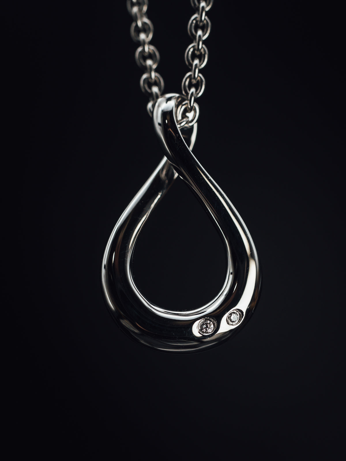 Sterling Silver Infinity Inspired Diamond Pendant