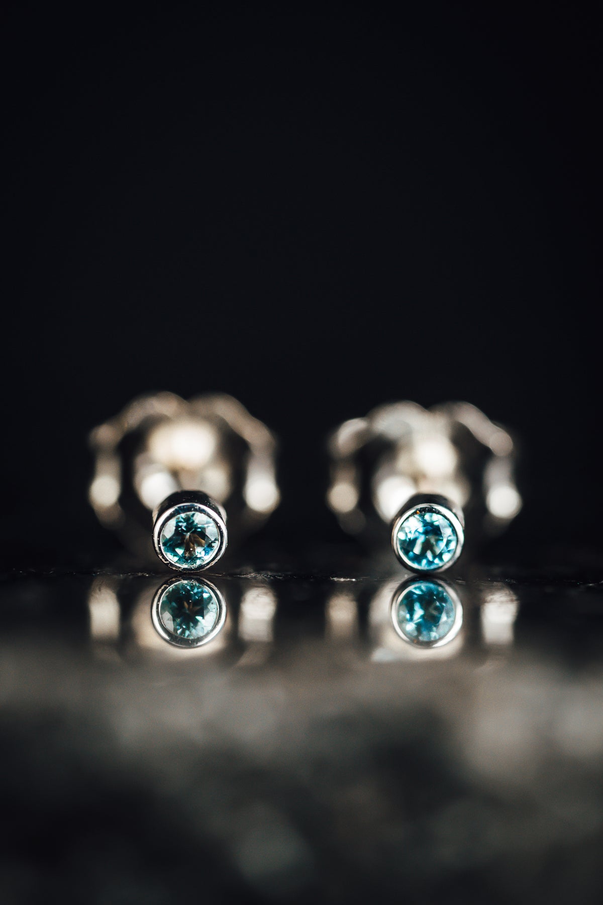 14k White Gold Blue Topaz Tiny Stud Earrings