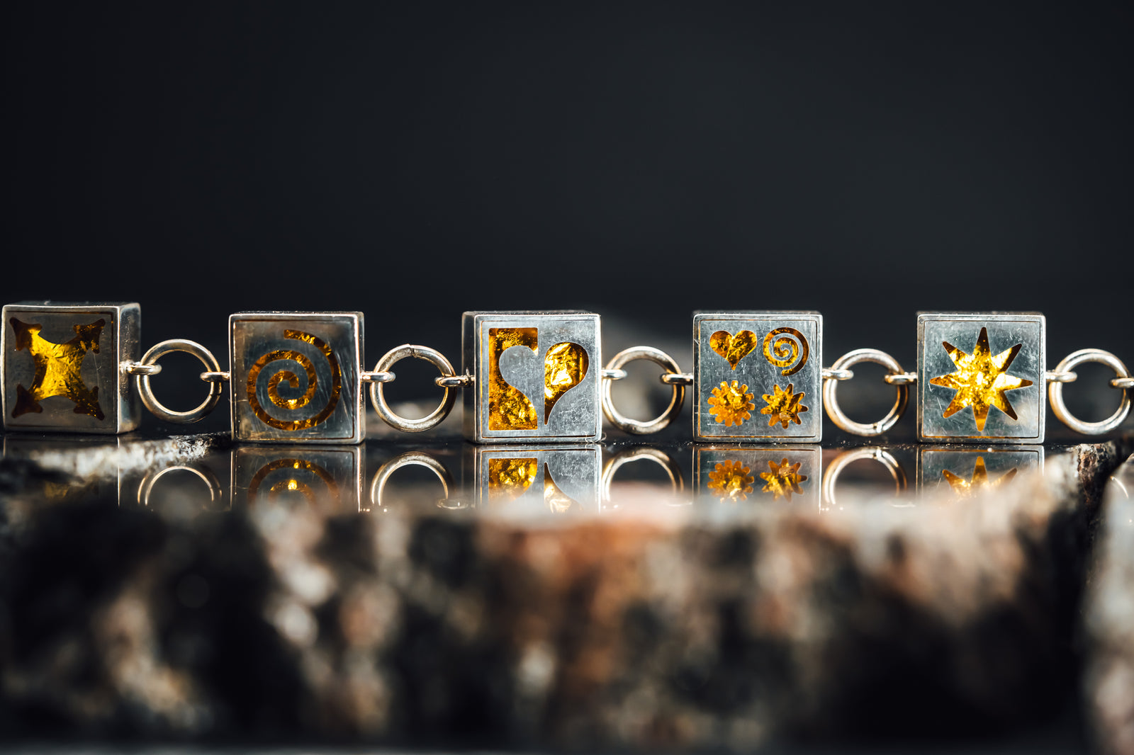 Sterling Silver Symbols Bracelet w/Gold Leaf Inside