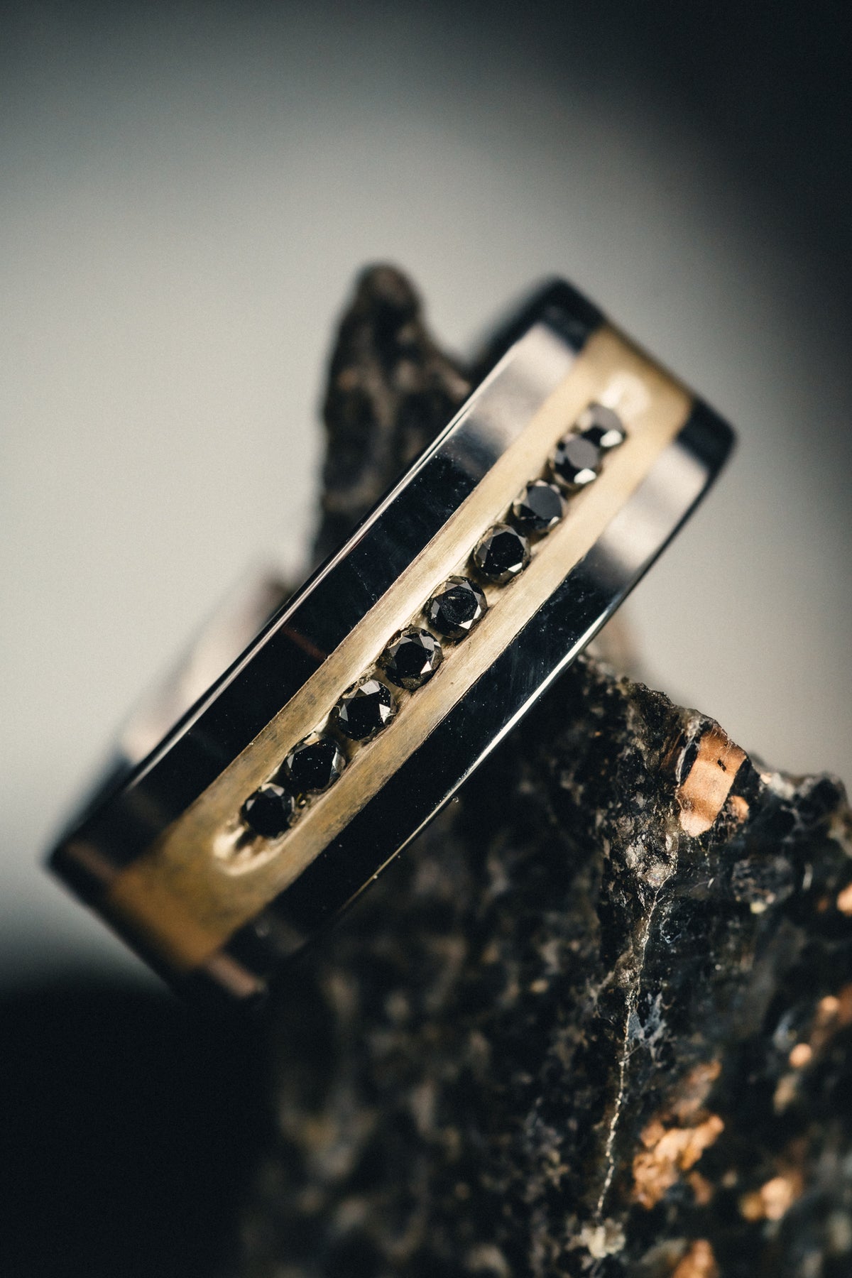 Flat Tungsten Wedding Band with Brushed Silver Inlay Center and 9 Channel Set Black Diamonds