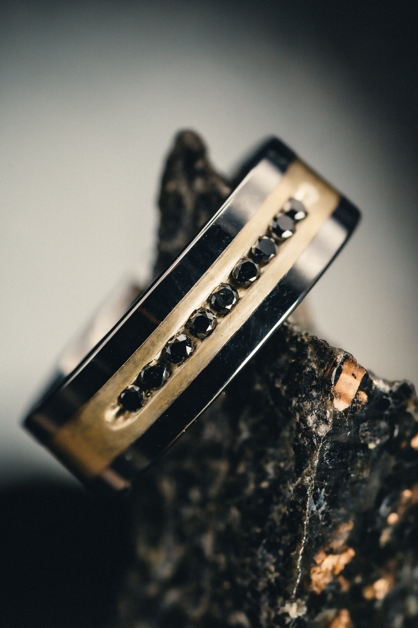 Flat Tungsten Wedding Band with Brushed Silver Inlay Center and 9 Channel Set Black Diamonds