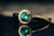 14k Yellow Gold Emerald and Diamond Halo Ring